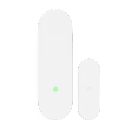 White ADT door and window contact sensor with its magnet