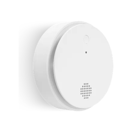 White ADT smoke detector, angled view